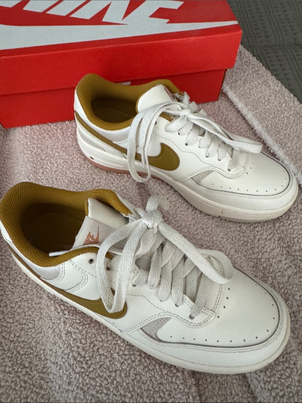 Nike White Low-Top Sneakers with Mustard Swoosh they’re called the Dream prm